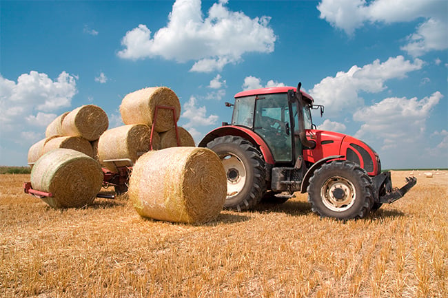 Tractor with Bales | Anderson Machinery